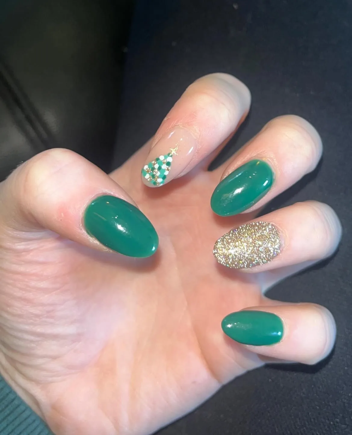 Green and gold nail design
